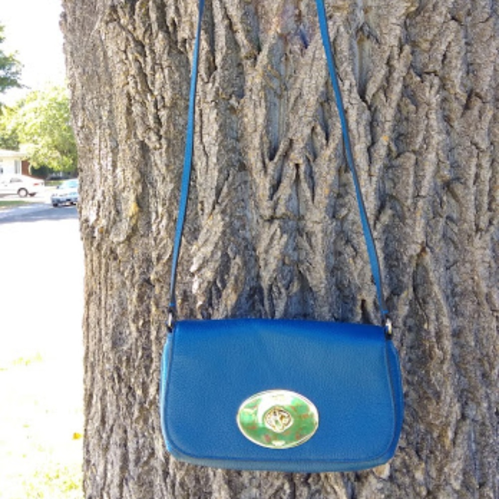 Bright blue Coach crossbody purse
